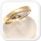 immagine fede nuziale in oro giallo e bianco doppia impernata con diamanti, immagine anello in oro giallo e bianco doppio impernato con diamanti, immagine fedi nuziali